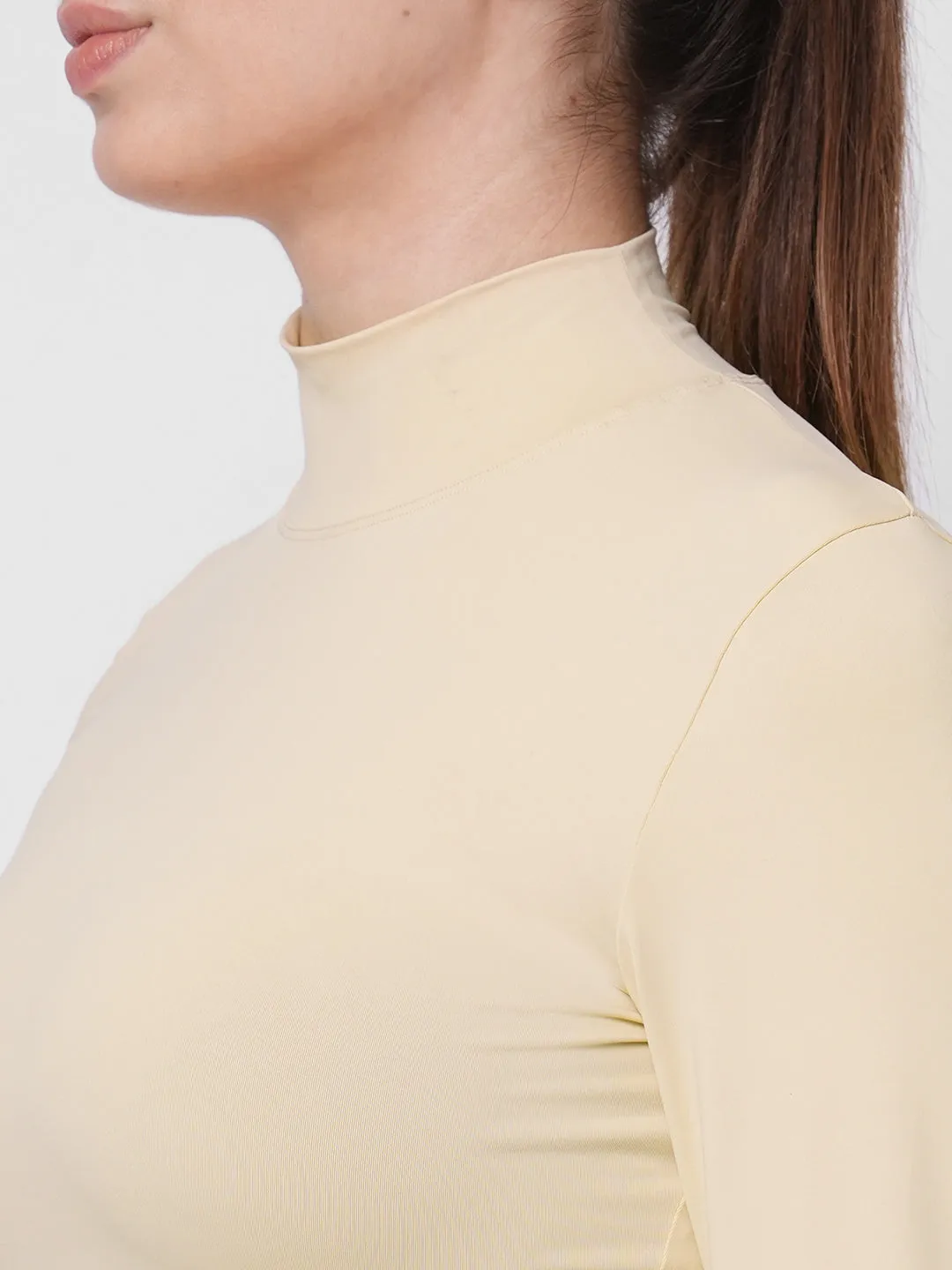 Fitkin women cream high neck fitted tshirt